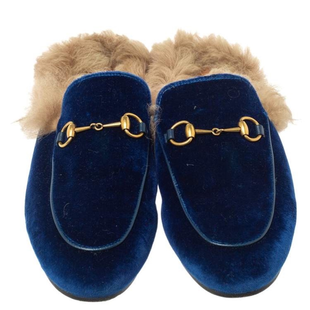Gucci fur loafers 
Navy Blue velvet
